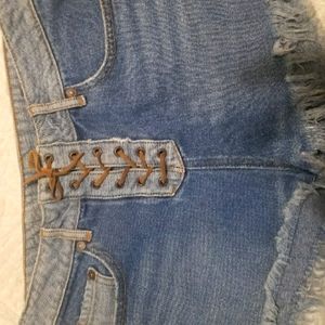 Frayed denim lace up Shorts